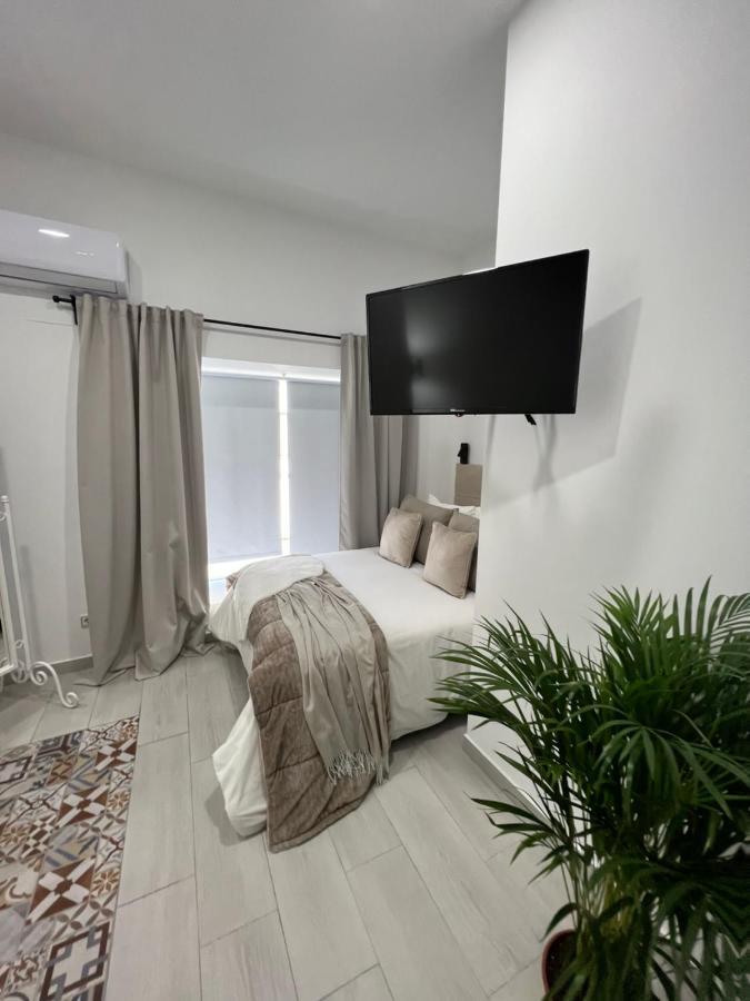 Suites Chic Herencia Bagian luar foto
